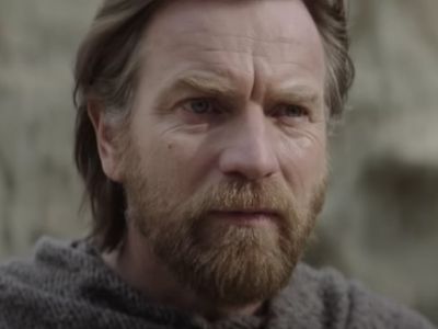 Ewan McGregor is staring at something in the distance.